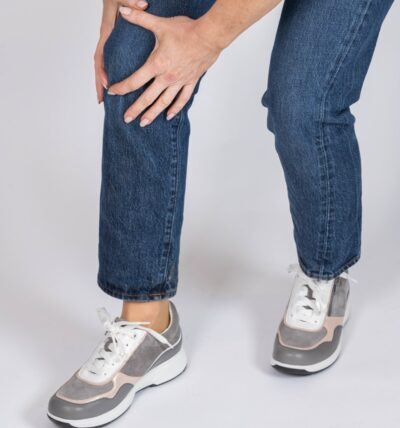 Person with a sore knee.