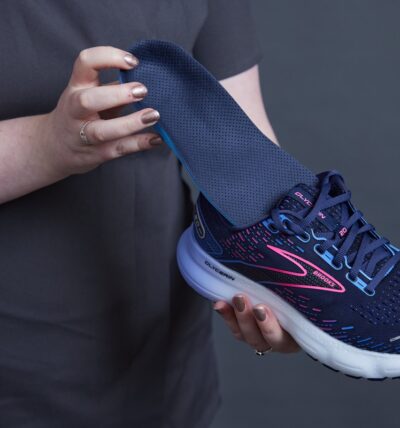 Shop assistant with a custom-made orthotic
